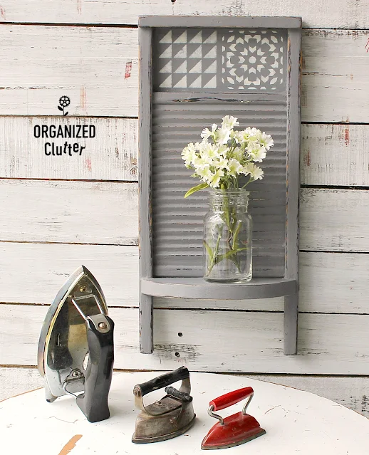 Photo of painted, stenciled washboard with shelf staged