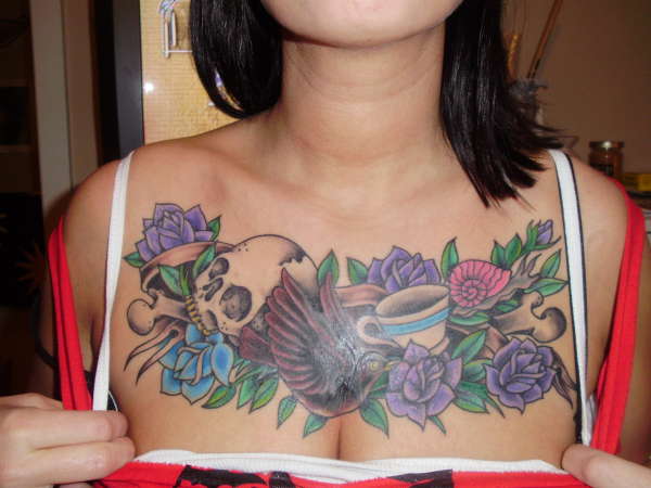 chest writing tattoo