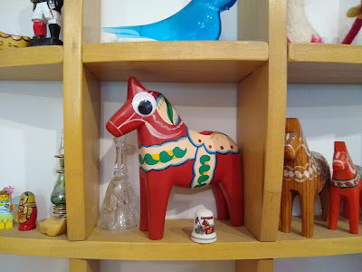 Swedish Dala horse with googly eyes attached