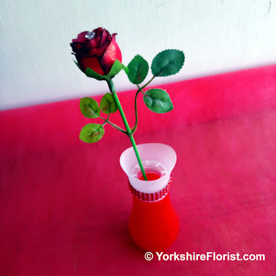  single diamond red rose in red bud jar with rubies