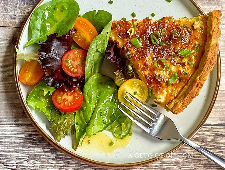 Spring onion (scalliion) quiche with salad.