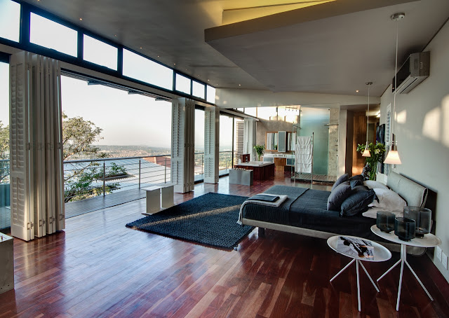 Modern bedroom with the balcony 