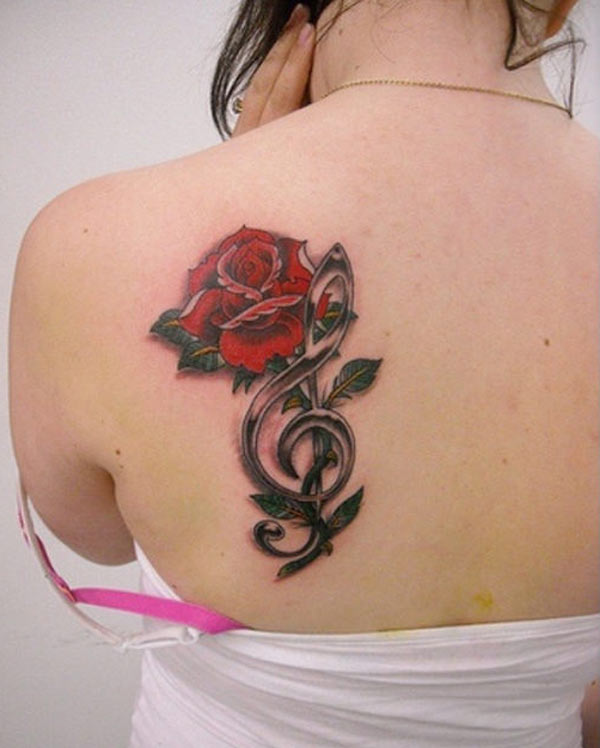 Red rose with music notes tattoo art ideas for lady back