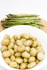 Asparagus and young potatoe close