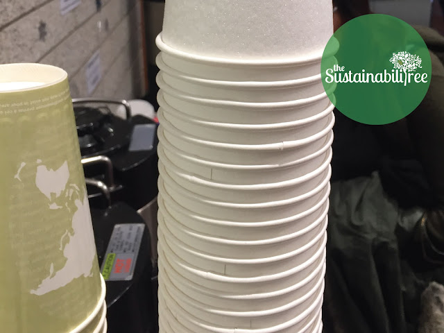 A stack of disposable coffee cups at uOttawa