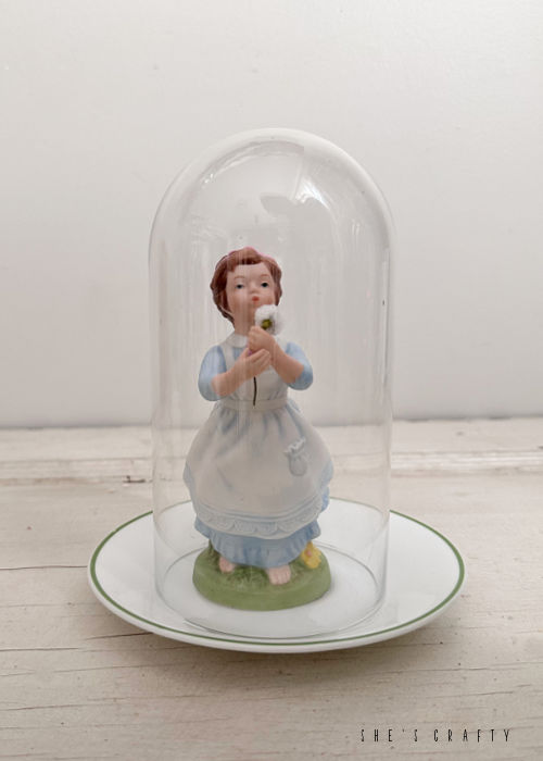 how to update a thrift store figurine - put glass cloche over the top.