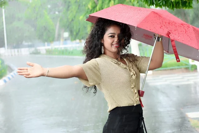 Pranati Nayak with umbrella