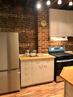 Gourmet Kitchen with Historic Charm - new appliances, exposed brick, wood beams