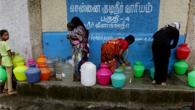People across Chennai are having to fill up pots at water distribution points