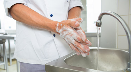 Which of these situations does NOT require a food handler to wash their hands