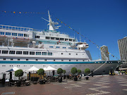 This cruise ship was docked at the Overseas Passenger Terminal at Circular . (overseas passenger terminal ship)