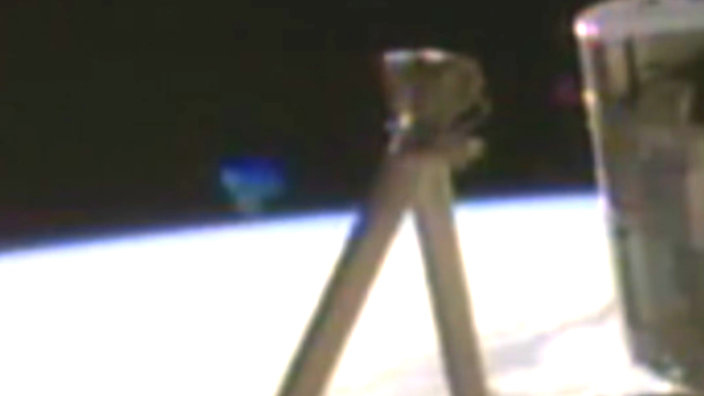 UFO sighting filmed by NASA's ISS live feed cameras with the UFO over Earth's horizon.