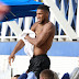 Anthony Joshua goes shirtless and exposes super chiselled body on Barbados beach