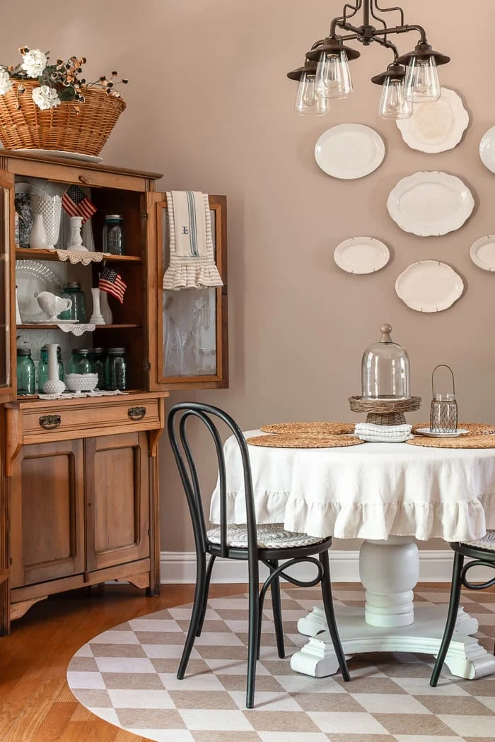 round table, pine hutch, vintage dishes