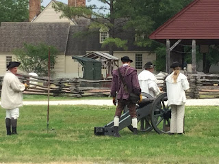 Colonial Williamsburg Canon Team getting ready to fire the canon