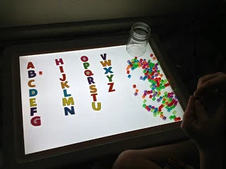 Letter matching with beads from Caution! Twins at Play
