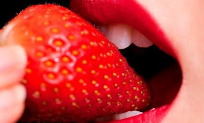 5 Foods That Improve Your Sex Life  - woman eat girl strawberry