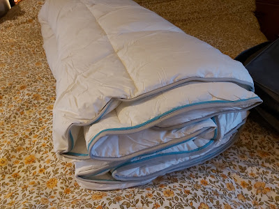 Simba duvet rolled up showing fabric