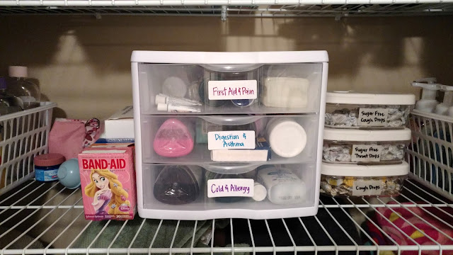 Use drawers, containers and labels to organize your medicine cabinet.