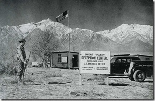 Military police gaurding the entrance to Manzanar