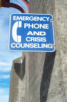 Sign saying Emergency Phone and Crisis Counselling