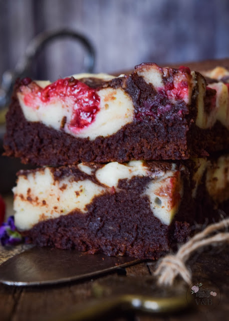 brownie cheesecake con frambuesas