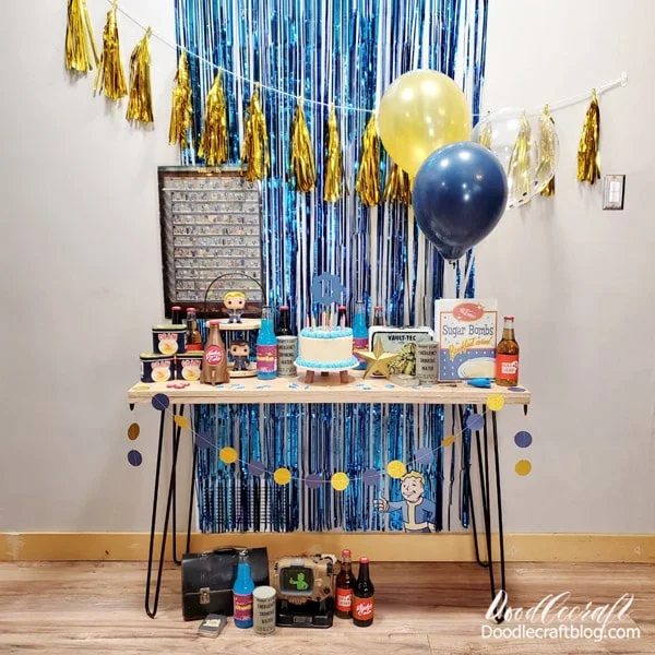 I printed out a little vault boy poster and stuck it under the table just for fun!   This hairpin leg table has been awesome for lots of parties and projects for years--make your own with this fun tutorial.