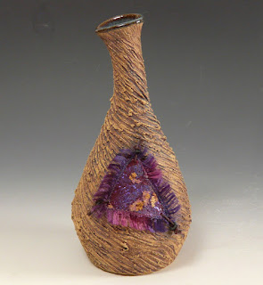 http://www.amazon.com/Clay-Fiber-Mixed-Media-Vase/dp/B0168Y767Q?ref=hnd_dp_car_mba_4