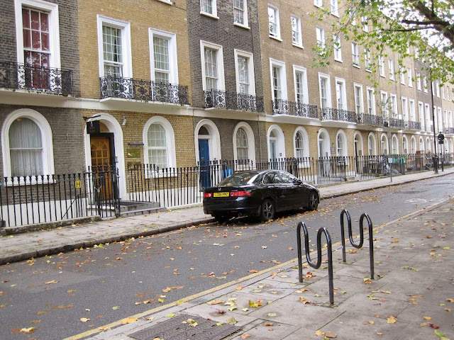 mens lifestyle blog, london kings cross, victorian houses london, bike rack london, black car london