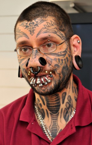 This guy actually got tribal tattoos - by the tribal tattoos experts