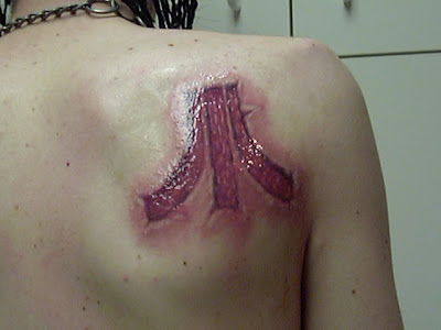 peeling tattoo. Tattoo aftercare peeling.
