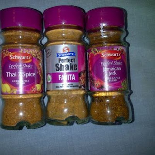 Jars of Schwartz Perfect Shake's seasonings in Jamaican Jerk, Fajita and Thai 7 spice.