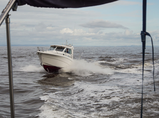 Photo of friends following us in their motor cruiser