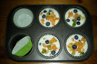 paper cups in a muffin pan