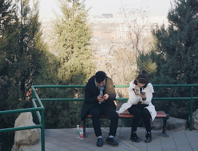 ignoring each other in favor of phone