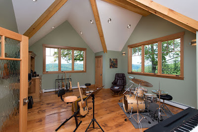 The home design includes a music room which shows off the homeowner's collection of instruments.