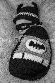 Newborn baby Jacob dressed as Batman