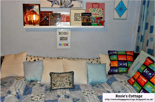 This gives us a bed for guests which can double as a very cozy book nook when the room is not being used for guests.