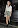 Emma Watson shows off legs in a floral mini skirt in London