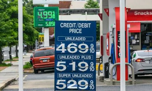 Gasoline prices are posted at a gas station in Washington on May 26, 2022.