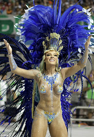 Dazzle: revellers from the Academicos do Tatuape samba school and the samba school Mancha Verde Special Group join in the first night of carnival parade at Sao Paolo's Sambadrome.