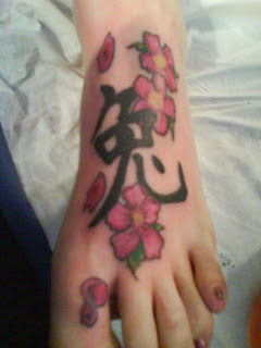 cherry blossom tattoos on foot