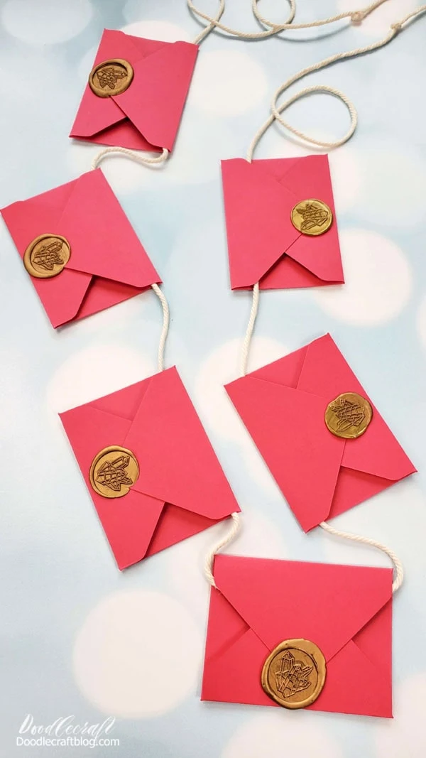 Repeat for every envelope on the garland!