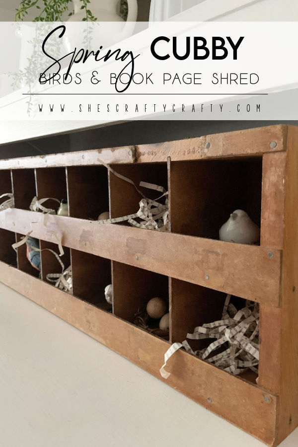 Spring Cubby with birds and book page paper shred pinterest pin.