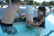 . Alyssa (with two other helpers) and went to the water park in McPherson. (img )