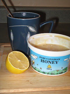 Hot water, lemon and honey sooths a sore tummy