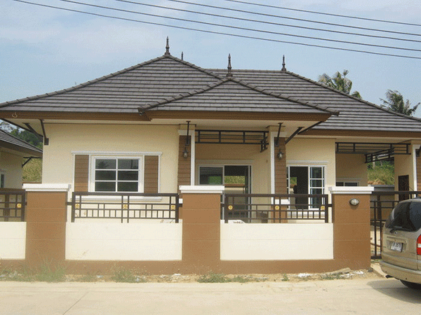 Bungalow style home designs were very popular anywhere in the world. Their layouts were very cheap, low-cost and affordable, and offered simple living with an artistic touch. Bungalow houses include one and a half stories with most living spaces on the ground, a low-pitched roof, and efficient floor plans and layouts. Bungalow home layouts position the living room in the center of the house floor plan, making them truly family friendly. It is usually for bungalows to have a secured entryway patio or sunroom with numerous windows making it a bright style for its littler size.  Bungalow homes will be homes that comprise of all the fundamental living regions situated on one story. The elimination of a second floor brings about the end of stairs, which can be alluring to certain property holders. These house designs can be intended to meet any size, style, or time that is wanted. Ordinarily, bungalow homes are the costliest homes to work as the state of the house is generally lengthened and hence, requires more concrete and rooftop.  The term "Bungalow" may refer to any humbly measured, one or one-and-a-half story home. Their basic designs and general moderateness influenced Bungalows to idealize contender for design books and kit homes, spreading their popularity all throughout the country. The Bungalow house configuration may highlight open idea format, with kitchen, rooms, and washrooms orchestrated simple availability. In spite of the fact that most bungalows have all the earmarks of being just a single story from the road, many offer a half-story under the rooftop, with upstairs rooms lit by shed-roofed dormers.  Check some out of these 50 photos of bungalow house designs for your inspiration. 