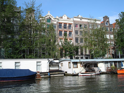 Amsterdam canal and boat houses