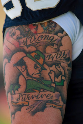 New Football club icon tattoo on the athlete's Arm