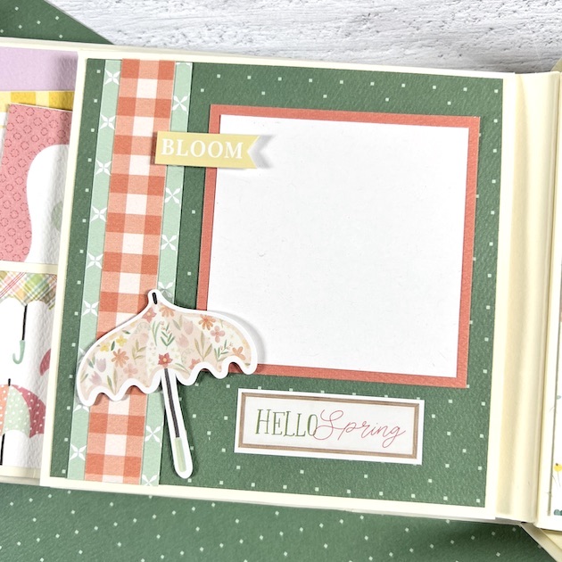 Hooray For Spring scrapbook album page with pretty pastel colors, flowers, and umbrellas